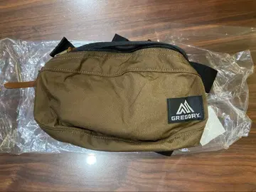 GREGORY 바디백 브라운