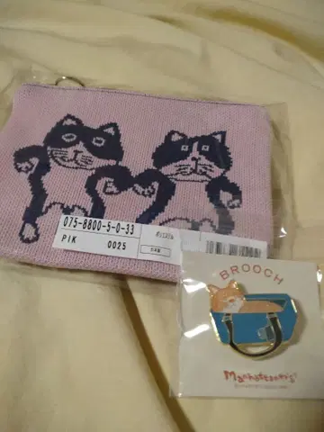 맨해트너즈 파우치와 브로치