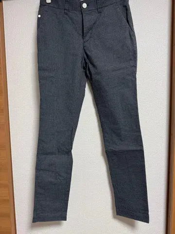 뉴발란스 체크 무늬 팬츠 그레이