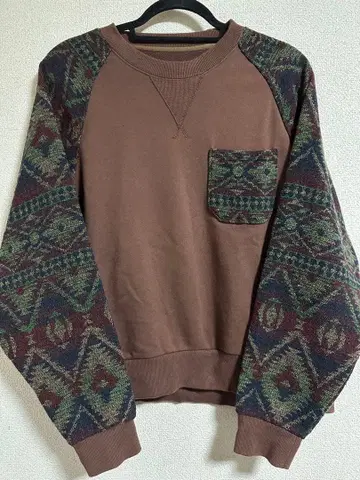 CUBE SUGAR 네이티브 무늬 소매 포켓 트레이닝복