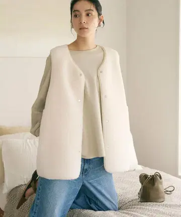 보아 페이크 무스탕 리버서블 베스트