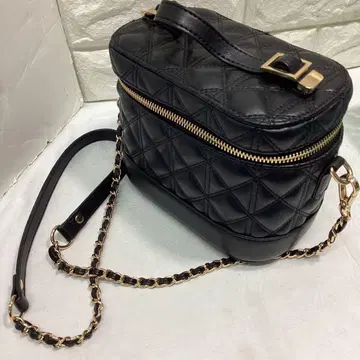 T RANDA 블랙 퀼팅 숄더백