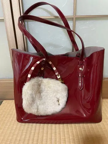 쿠 드 샹스 핸드백