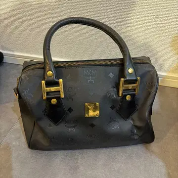 MCM 미니 보스턴 핸드백 블랙 가죽 골드 금장 장식
