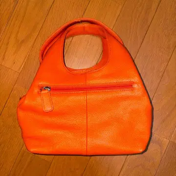 오렌지 핸드백 가죽 느낌