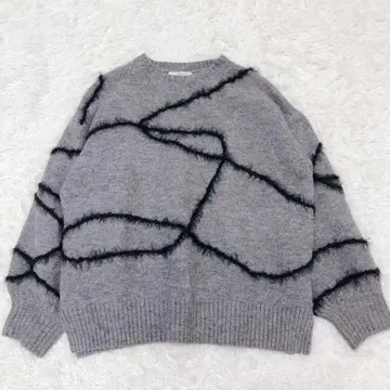 디스코트 멜란지얀 올 패턴 풀오버 라인 아트 스웨터