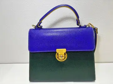 보라색과 그린의 숄더백