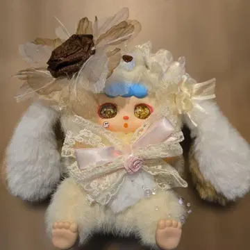 토끼 봉제 인형 꽃과 리본 포함