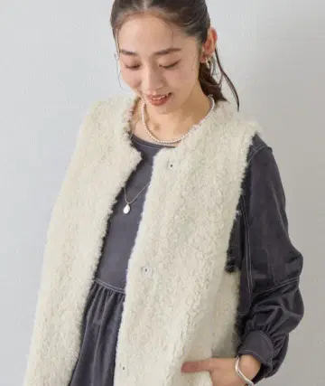 un dix cors(앤디콜) 시프라이크 니트 베스트