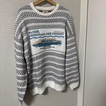 SON OF THE CHEESE 올 패턴 크루넥 니트 그래픽