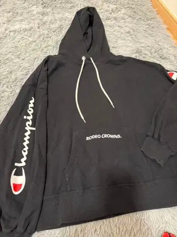 Champion Rodeo Crowns 콜라보 후드티 블랙