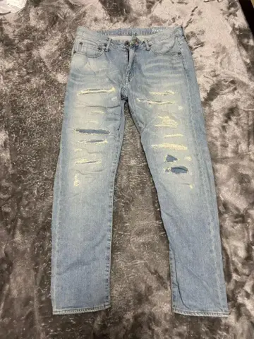 데미지 가공 스키니 데님 라이트 블루