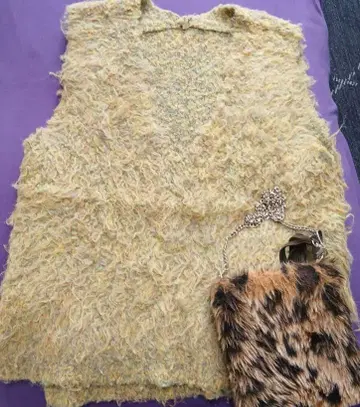 안티카 니트 베스트