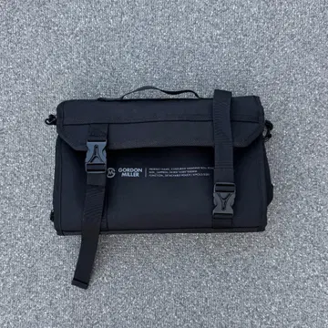 GORDON MILLER 코듀라 행잉 롤 파우치 블랙