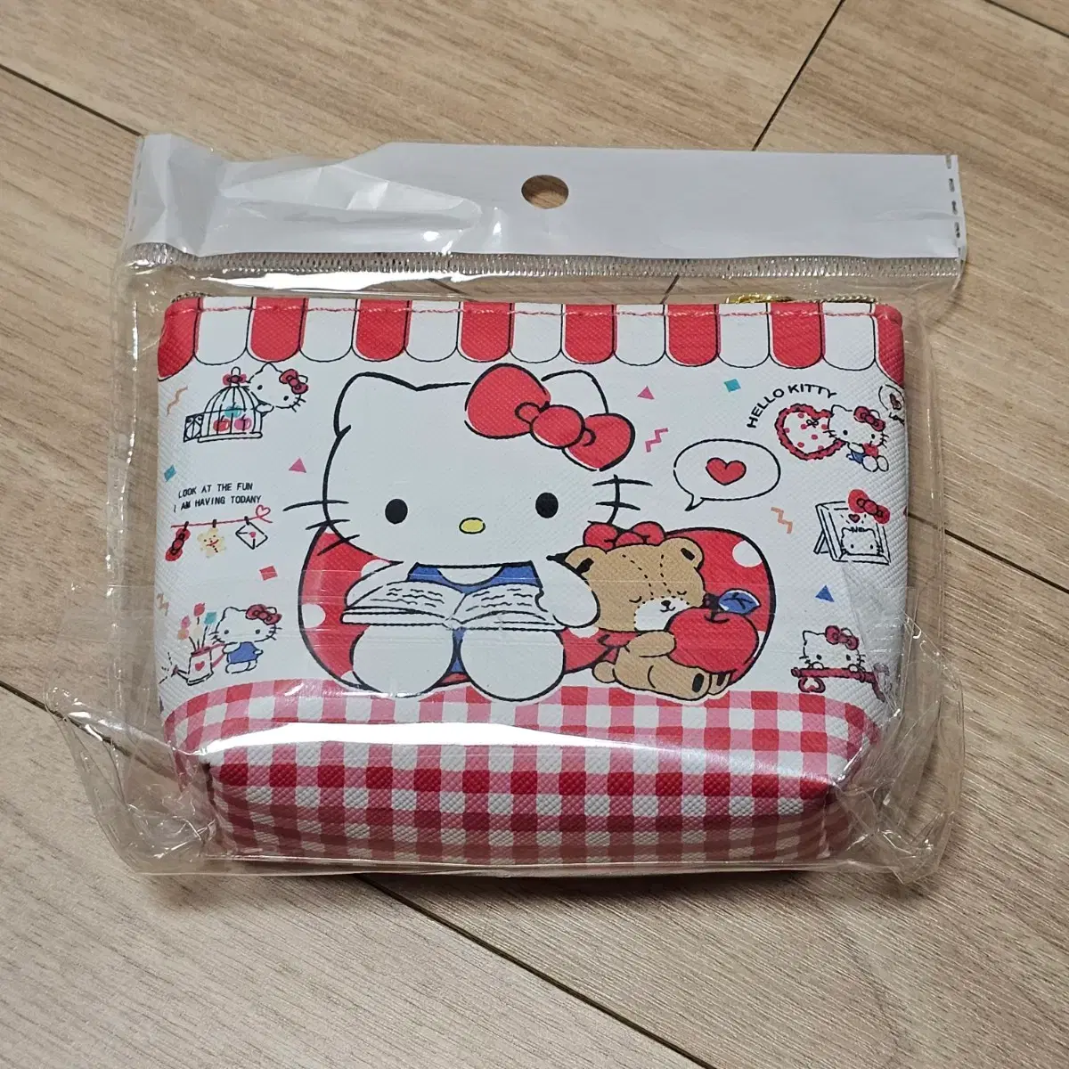 Unopened new Hello Kitty coin purse, pouch #산리오,#헬로키티,#동전지갑,#카드지갑,#키티 on  Bunjang Global Site.