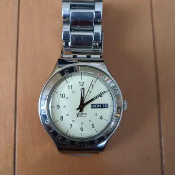 Swatch 아날로그 쿼츠 손목시계 실버