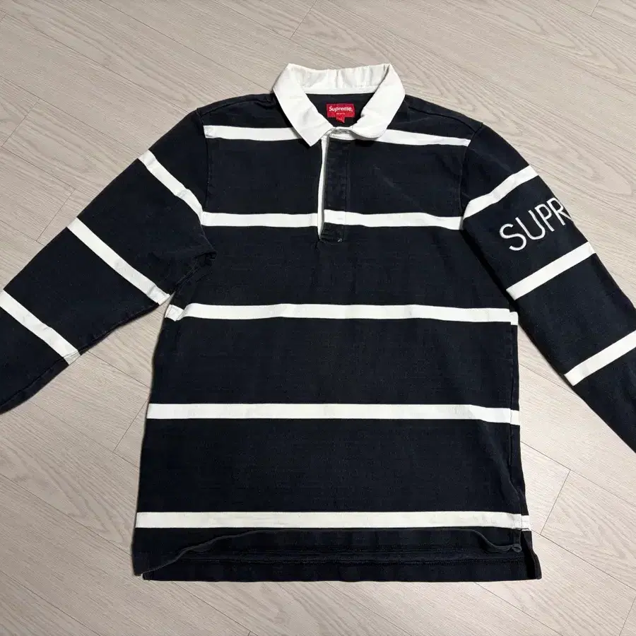 Supreme Stripe Rugby Shirt M on Bunjang Global Site.