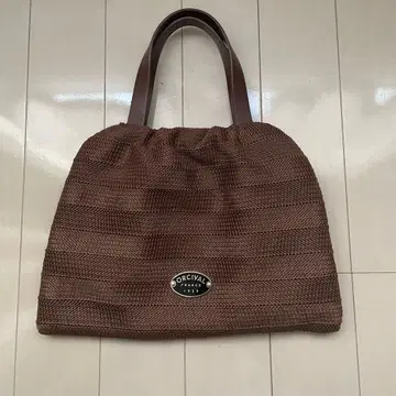 ORCIVAL 라피아라이크 가죽 핸들 복조리 백 브라운