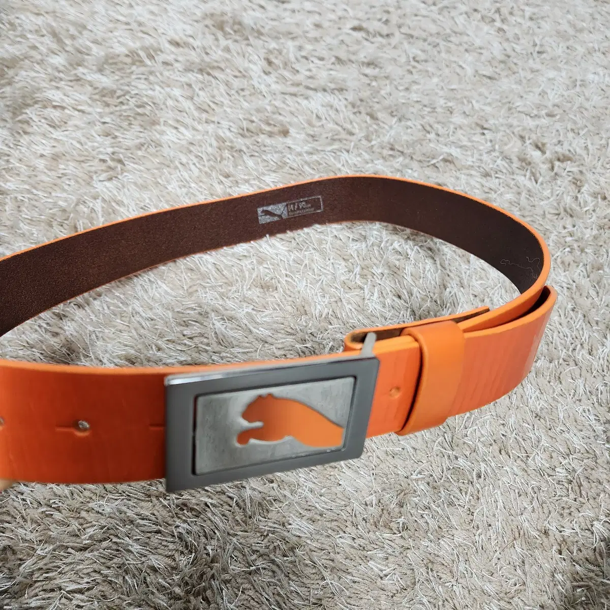 orange puma golf belt