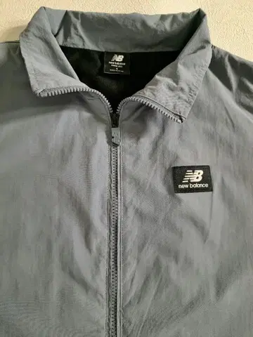 new balance 윈드브레이커