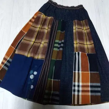 카스리 체크 무늬 패치워크 플레어 스커트