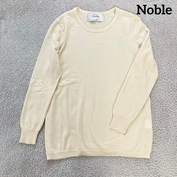 Noble 울 크림색 긴팔 니트 스웨터