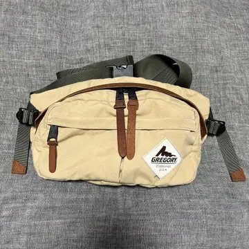 GREGORY 그레고리 구 로고 테일 게이트 선버드 힙 백