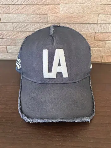 론 헤르만 x 요시노리 코타케 캡