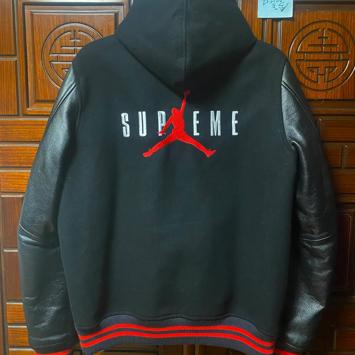 supreme x jordan varsity jacket