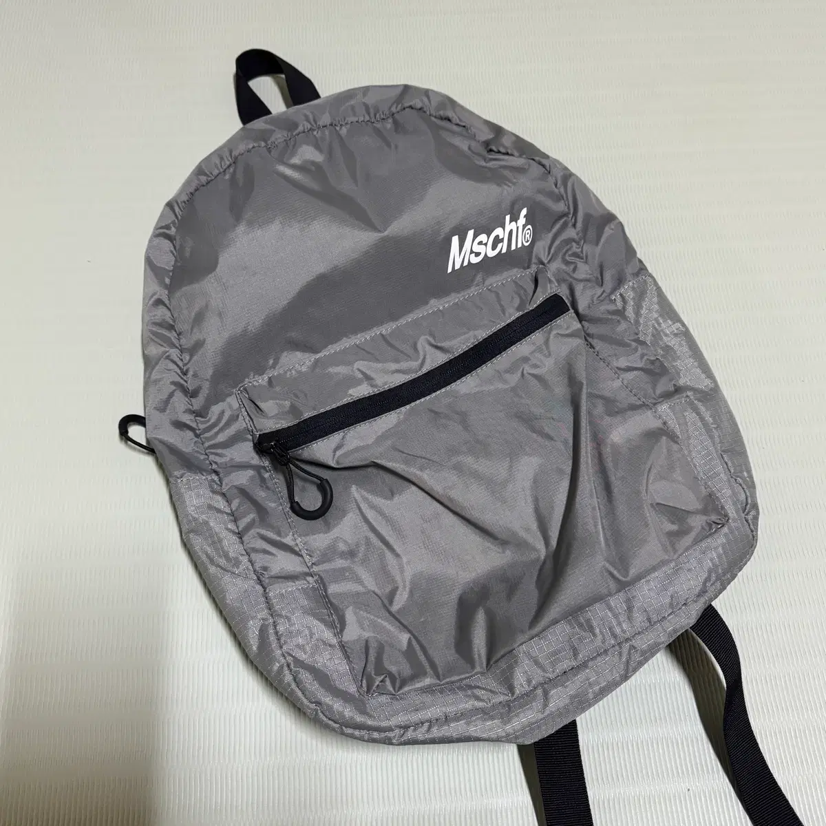 MISCHIEF | 미스치프 Mischief Rhombus Pocket Sling Bag Blue Gray on