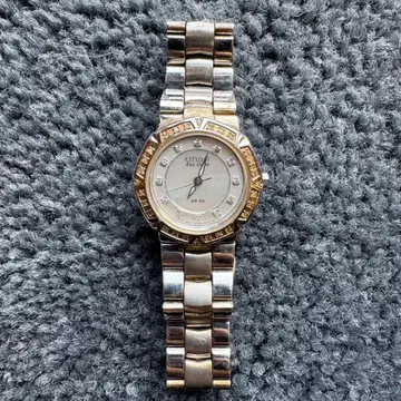 CITIZEN 시티즌 에코 드라이브 E031-S053650 손목시계