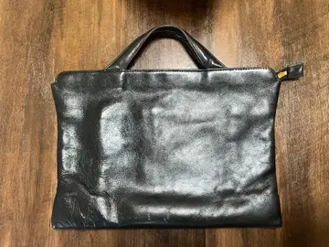 [ 대폭 할인 중 ] TRION 지퍼 달린 비즈니스 가죽 백