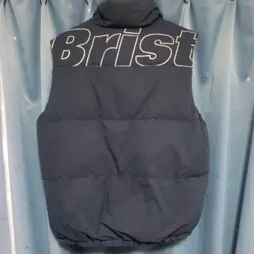 새상품급 브리스톨 리버서블 다운 베스트 L 네이비 뒷면 로고