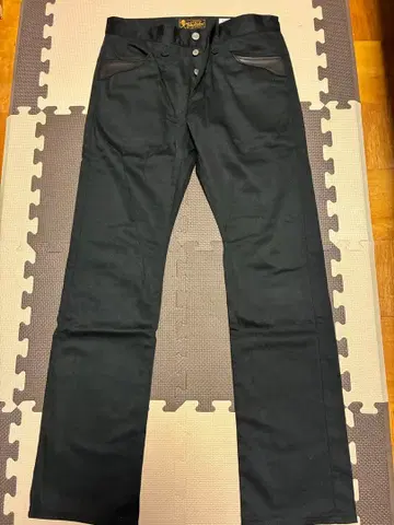 루드 갤러리 브릿 가죽 절개 트라우저 팬츠