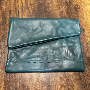 청록색 가죽 클러치백