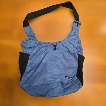 파타고니아 라이트웨이트 트래블 쿠리에 블루