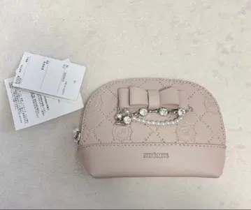 노에미 모노그램 엠보싱 파우치 핑크