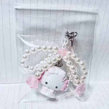 산리오 화이트 프릴 디자인 시크릿 스트랩 코기뮨