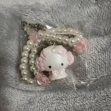 산리오 화이트 프릴 디자인 시크릿 스트랩 코기뮨