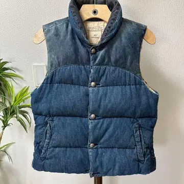 REMI RELIEF 다운 베스트 네이비