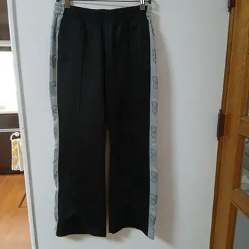 메종 에메랄드 버터플라이 웨빙 팬츠 트랙 플레어