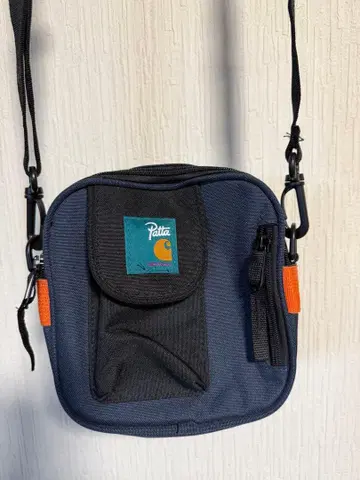 Patta 칼하트 숄더백 네이비/오렌지