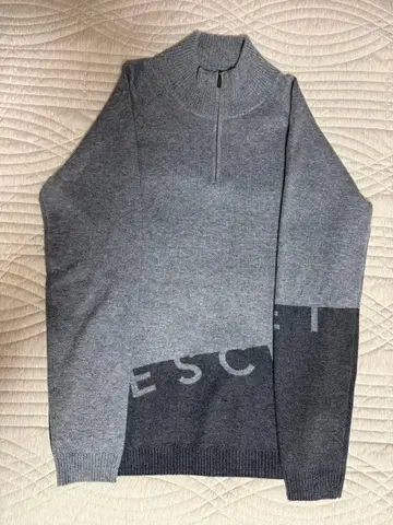 데상트 골프 하프 지퍼 니트