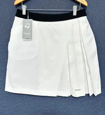 테일러메이드 화이트 플리츠 스커트