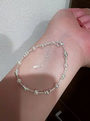 오로라처럼 빛나는 담수 펄 x 925 실버 뜨개질 팔찌