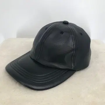 쿠티 캡 램 가죽 소가죽 블랙