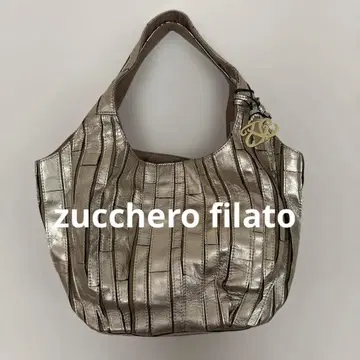 새상품 [ zucchero filato ] 패치워크 가죽 백 골드