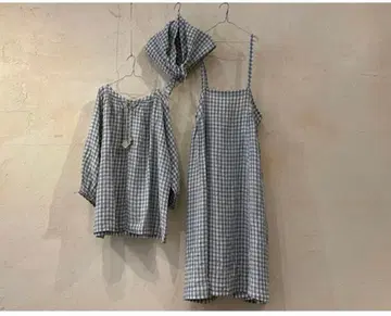 네스트로브 컬러 깅엄 태슬 멜빵 치마