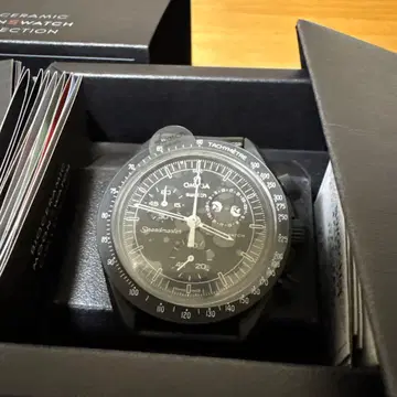 OMEGA 스피드마스터 문페이즈 스누피