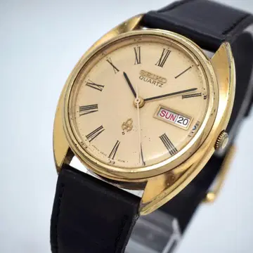 136 작동 SEIKO 시계 남성용 골드 데이데이트 로만 문자 레어